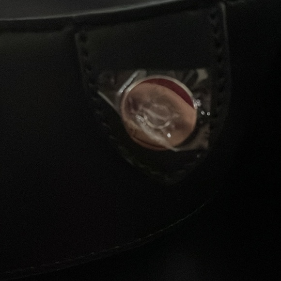 CK drawstring bucket bag. Plastic still on the hardware. And smells great. - Picture 5 of 6